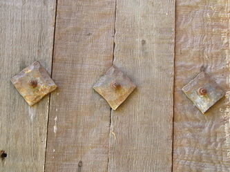 3 metal bold ends on old wood barn, rusted metal rung from old equipment, Linda A. Levy, Linda Levy, LA Levy, art, arts, artist, arts advocate, painting, digital painting, digital art, digital art work, graphic design, graphic designer, ceramics, ceramicist, ceramic art, sculpture, ceramic sculpture, Santa Cruz California