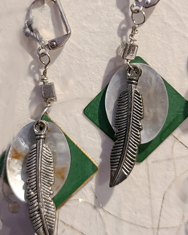 Silver feather - Linda Levy has been creating Jewelry, Necklaces, Earrings, Gemstone jewelry, handcrafted, original art, in Santa Cruz California
