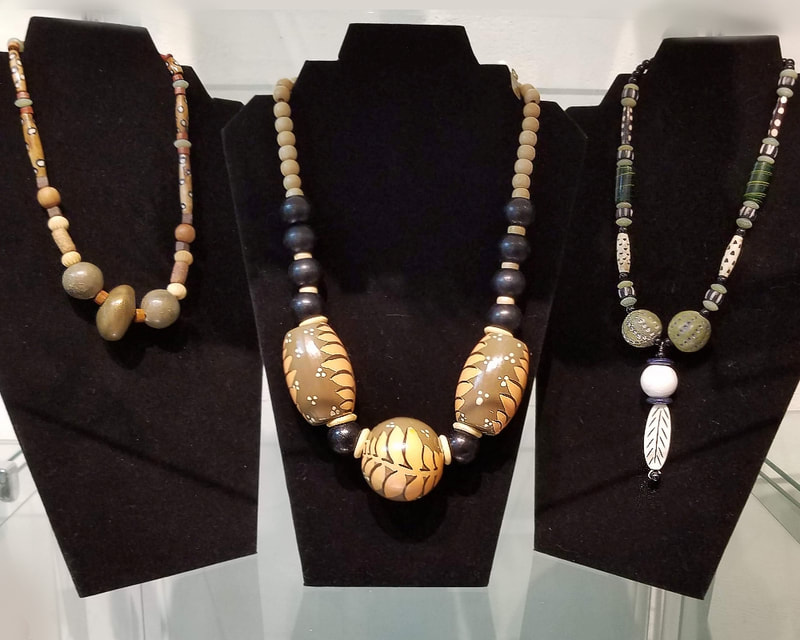 Big statement necklaces by Linda Levy, handmade using wood, bone, ceramics, glass, metal findings